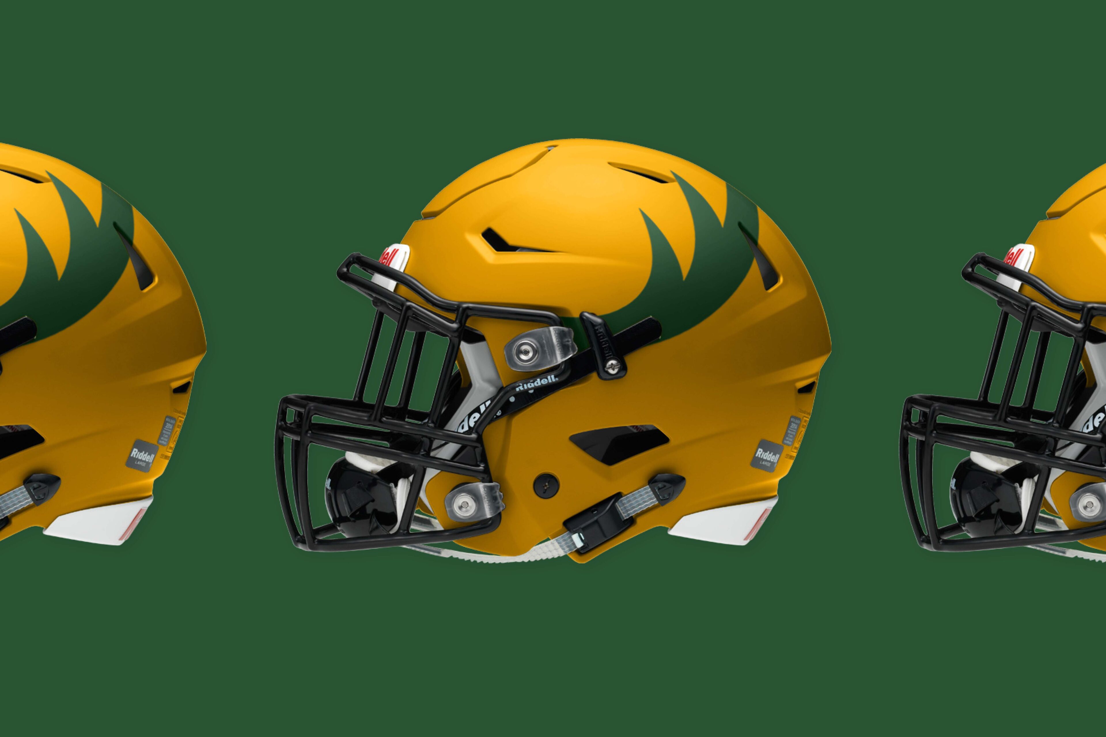 Edmonton Elks football helmets featuring a gold design with a green antler logo and black faceguard