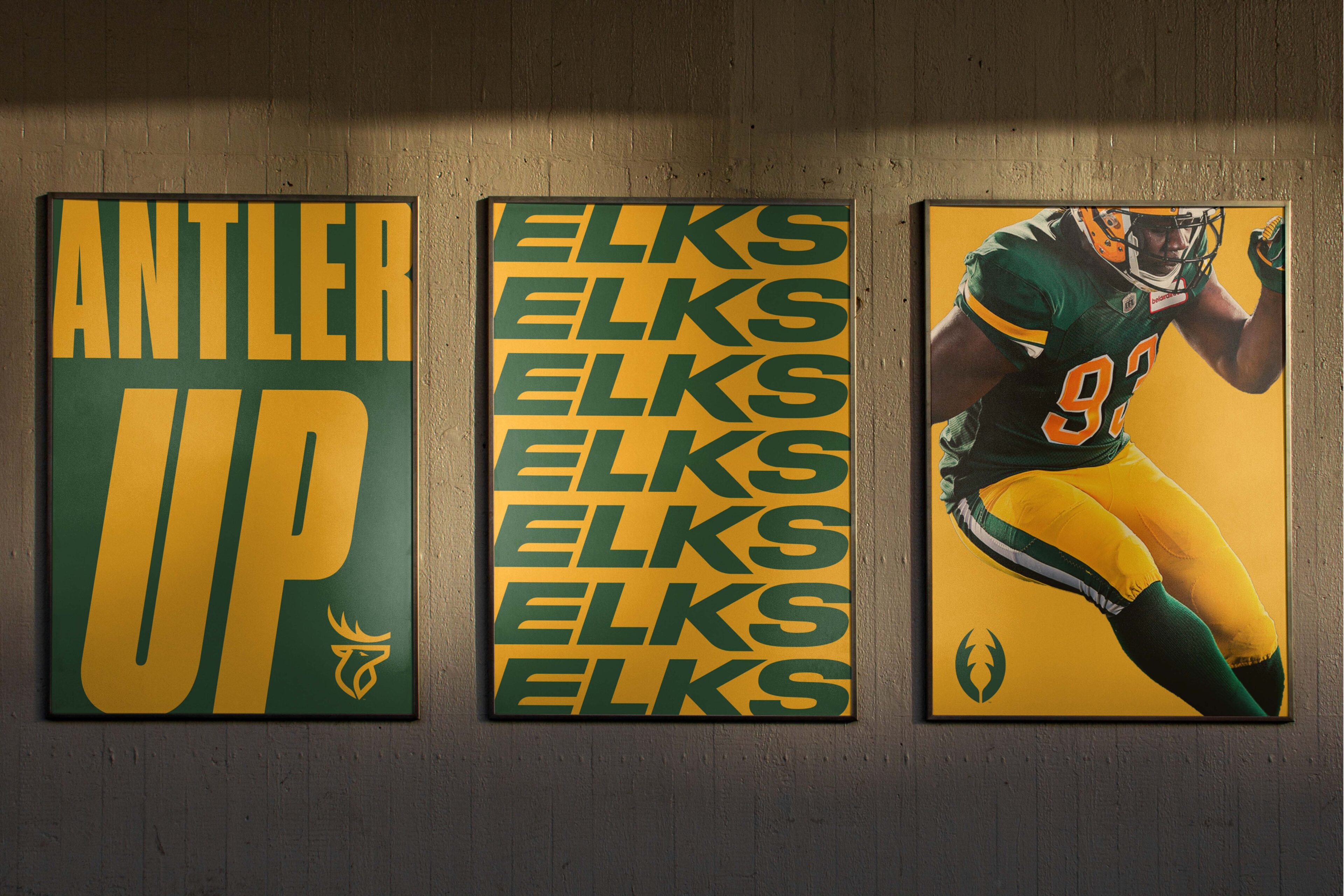 Posters on a wall featuring 'ANTLER UP' and multiple 'ELKS' text with a player in Elks uniform