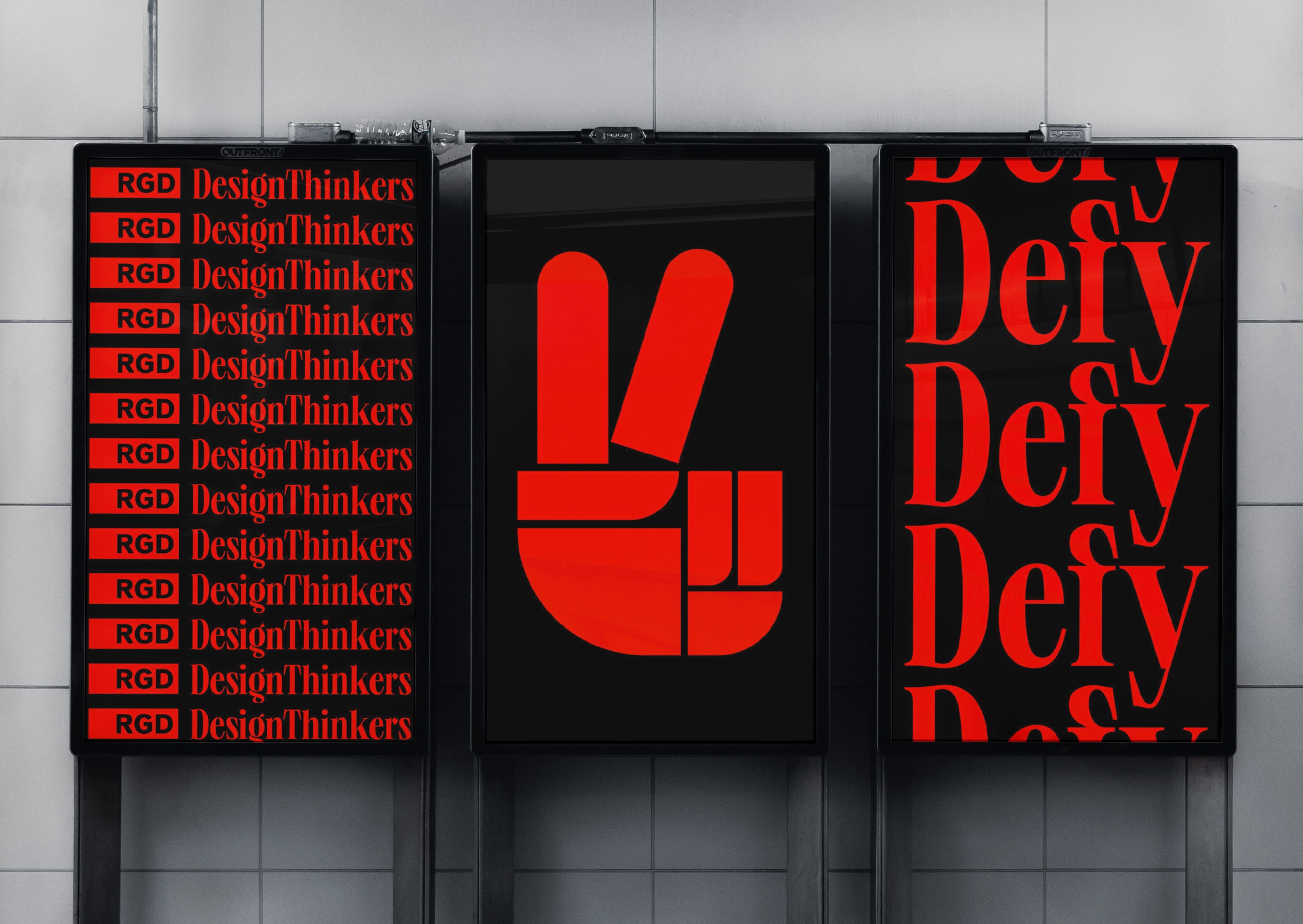 Three posters with the DesignThinkers and Defy graphics in bold red and black, featuring a peace sign icon